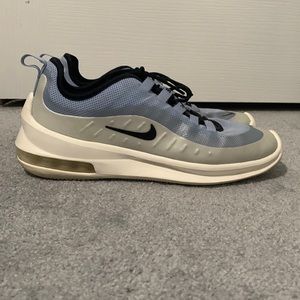 blue, white, and black Nike Air Max’s.